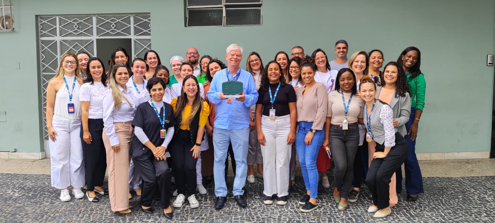 Equipe comemorando o Selo de Excelência Unimed